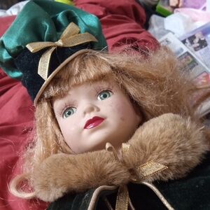 Elegant Doll with Green and Gold Outfit